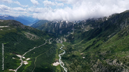 Aerial view of mountain winding road Furka pass in Alps, Switzerland.