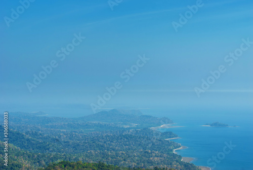 Panoramic view of the mountain tropical coast covered with rainforest