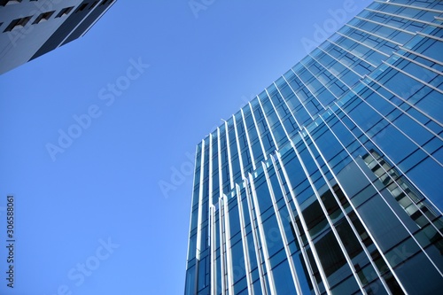 Abstract texture of blue glass modern building skyscrapers. Business background.