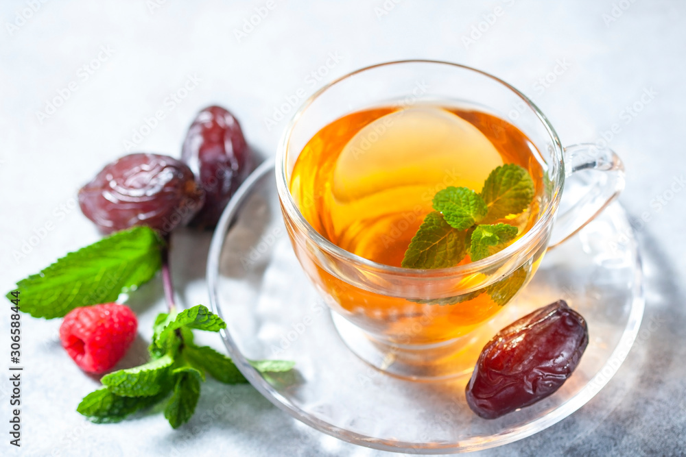 Mint tea with dates. Arabic style Mint tea with dates. Arabic style