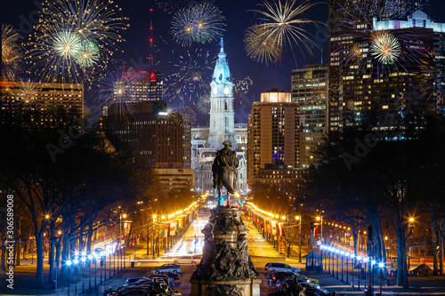 Colorful Fireworks  in Downtown Philadelphia, Pensilvania, USA. Cityscape celebrating New Years Eve with George Washington Statue in the Middle. photo