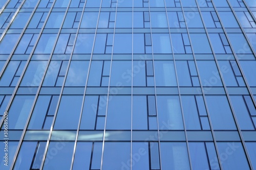 Abstract texture of blue glass modern building skyscrapers. Business background.