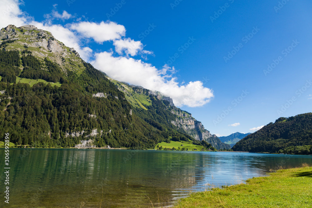 Natural mountain lake Klöntalersee . Glarus Canton.  Switzerland.
