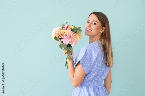 Beautiful young woman with ...