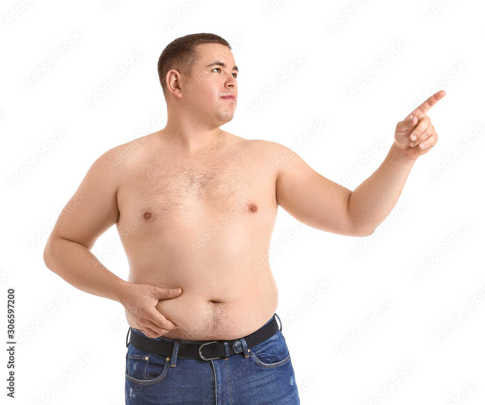 Overweight man pointing at something on white background Overweight man pointing at something on white background