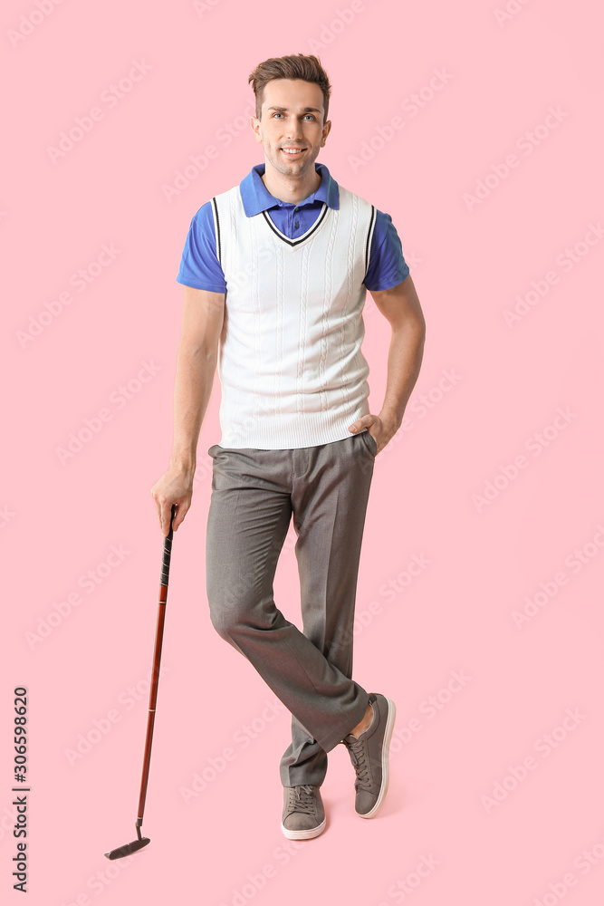 Handsome male golfer on color background Handsome male golfer on color background