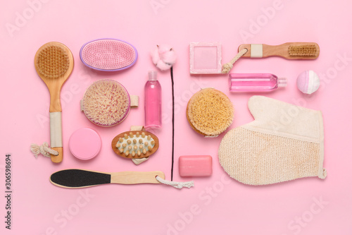 Cosmetics and accessories for bath on color background