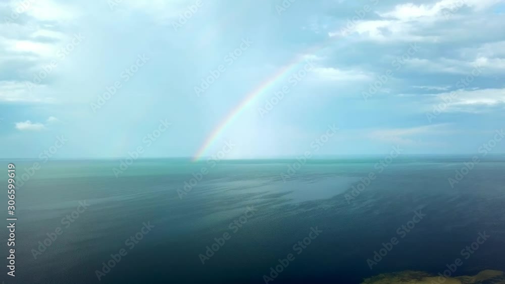 aerial view of rainbow over the sea, aerial view of Rainbow above the sea and island, aerial view of Dzharylgach island with raindbow, aerial view of lakes on the island and rainbow aerial view of rainbow over the sea, aerial view of Rainbow above the sea and island, aerial view of Dzharylgach island with raindbow, aerial view of lakes on the island and rainbow