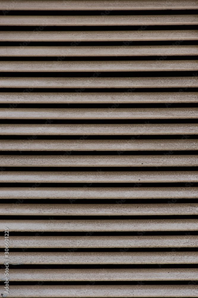 Background from shabby rust blinds is close Background from shabby rust blinds is close