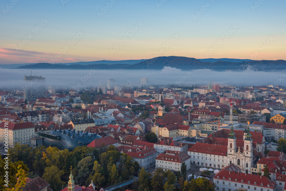 Cityscape of Graz from Shlossberg hill, Graz, Styria region, Austria, in autumn, at sunrise
