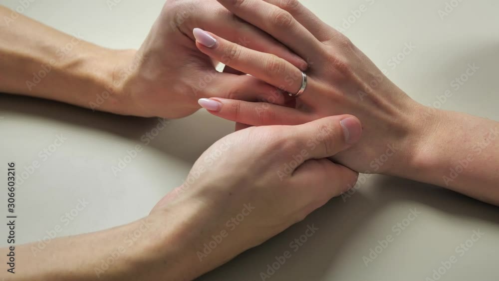 Man put on engagement ring on woman finger. Proposal. Romantic moment 4k Man put on engagement ring on woman finger. Proposal. Romantic moment 4k