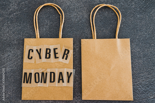 cyber monday shopping bag next to another blank one