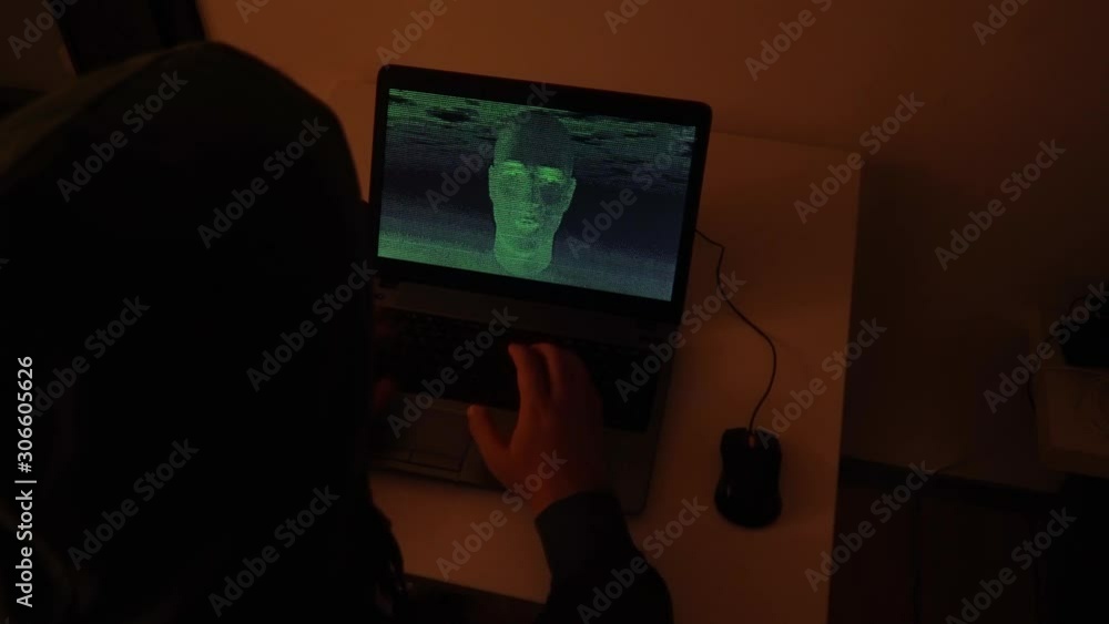 Developer coding the first artificial intelligence on laptop Developer coding the first artificial intelligence on laptop