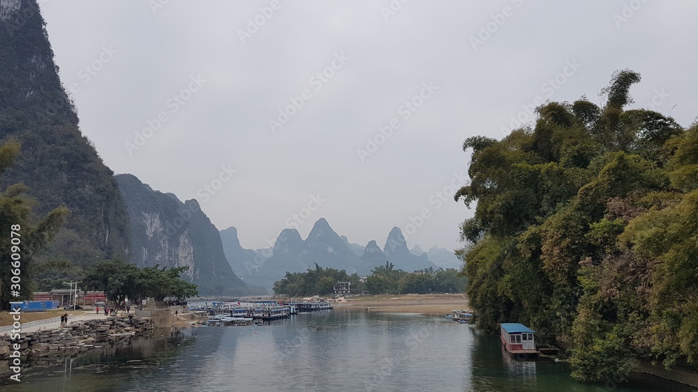 beautiful lansdcape of Guilin, China mountains with fog in the sky