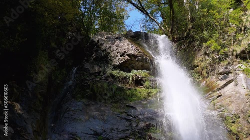 Makhuntseti Waterfall in Autumn. Falling Water Hitting on the Rocks. Slow Motion. photo