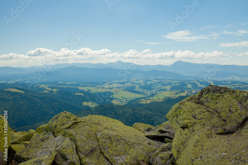 Beautiful mountain landscape, with mountain peaks covered with forest and a cloudy sky. Ukraine mountains, Europe