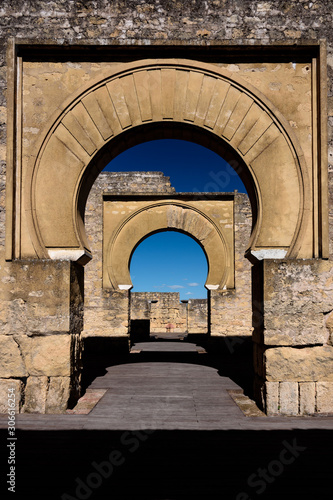 archs and columns in medina, view of the ancient ruin of medina azhara close to cordoba, spain photo