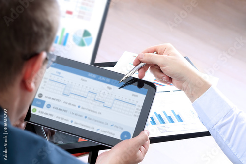 Safety manager shows logbook on a tablet