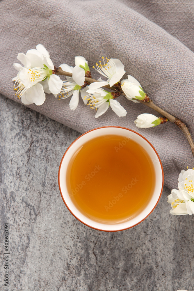 cup of tea with jasmine flowers