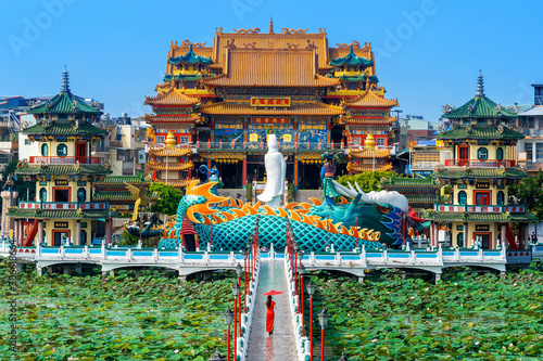 Photography Asian woman in chinese dress traditional walking at temple in Kaohsiung, Taiwan