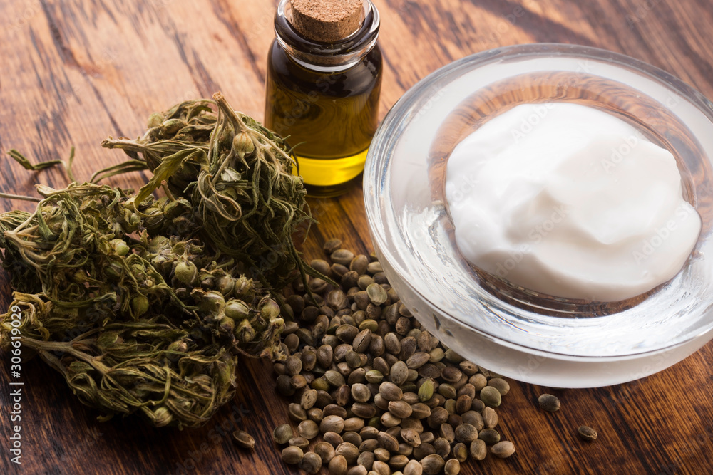 Cannabis oinment natural product. Cosmetic cream from natural hemp, moisturizing lotion with CBD content Cannabis oinment natural product. Cosmetic cream from natural hemp, moisturizing lotion with CBD content