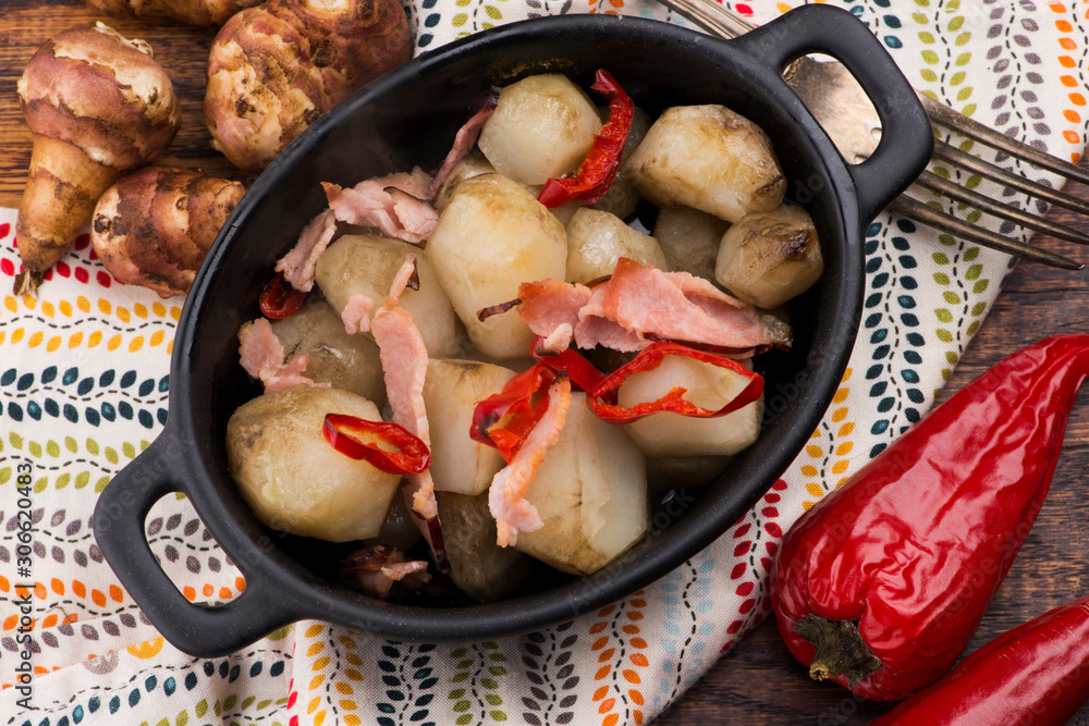 Jerusalem artichoke au gratin with ham and chili. Fricassee, fruits Jerusalem artichoke au gratin with ham and chili. Fricassee, fruits