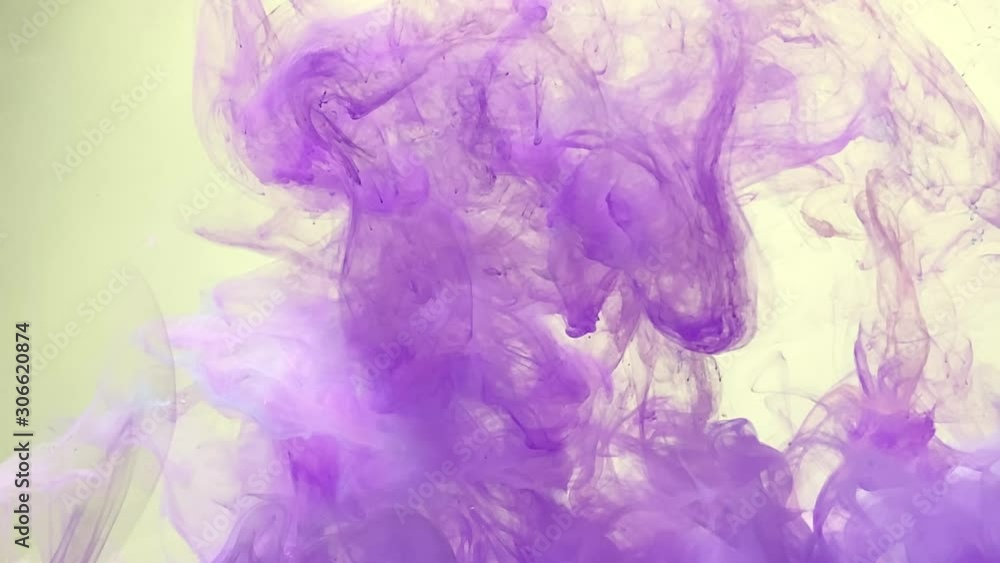 Purple smoke. Abstract lilac background. Stylish background. Violet watercolor ink on a white background. Smooth movement of acrylic ink. Amazing trending background. Purple smoke. Abstract lilac background. Stylish background. Violet watercolor ink on a white background. Smooth movement of acrylic ink. Amazing trending background.