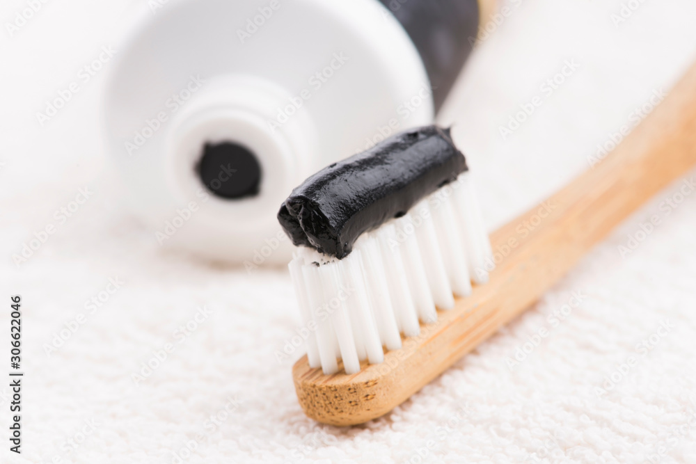 Toothbrush with black charcoal toothpaste Toothbrush with black charcoal toothpaste