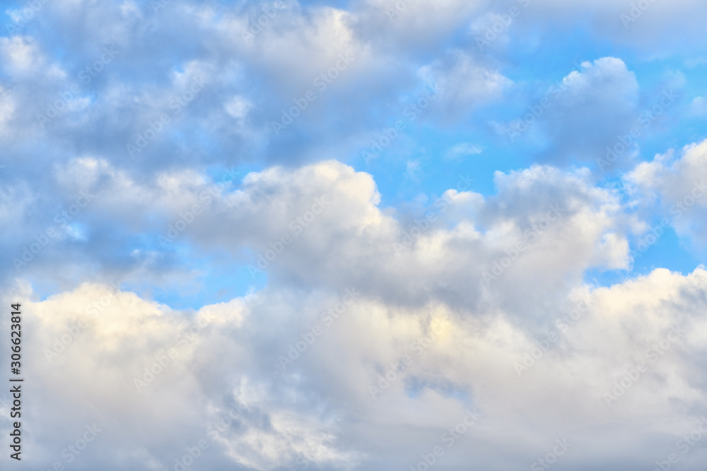 Beautiful blue sky with clouds on a bright day. Vertical photography Beautiful blue sky with clouds on a bright day. Vertical photography