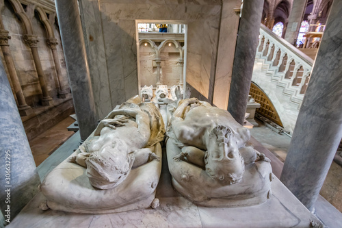 Marble recumbent sculptures of Henry II and Catherine de' Medici on their tomb in Basilica Cathedral of Saint-Denis, Paris