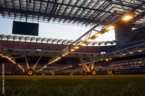 Artificial MLR light for growing sports natural lawn illuminates the grass at the stadium Giuseppe Meazza or San Siro, built in 1925.