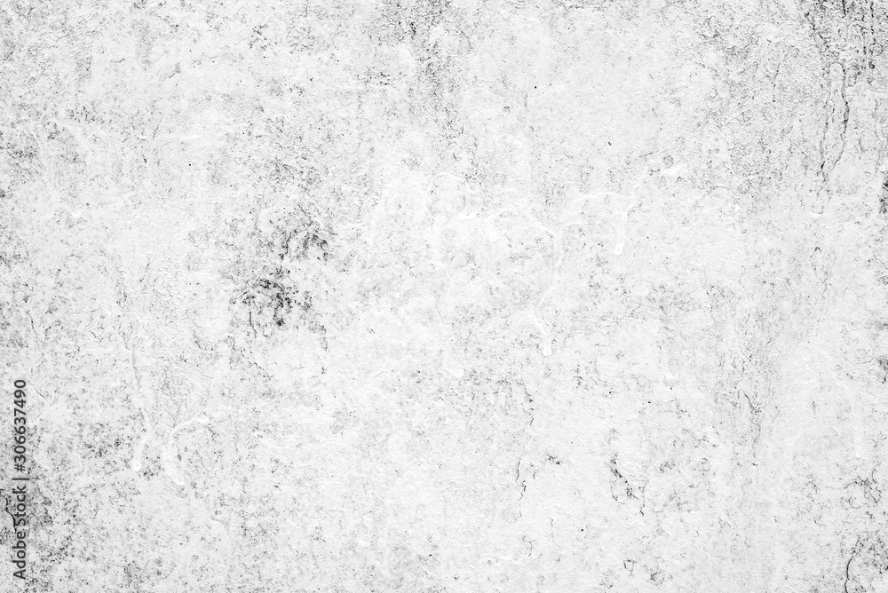 Texture of a concrete wall with cracks and scratches which can be used as a background Texture of a concrete wall with cracks and scratches which can be used as a background