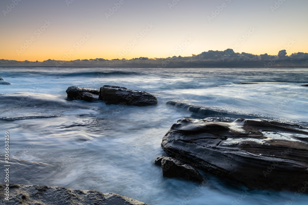 Fototapeta premium Sunrise Seascape with Low Cloud Bank from Rocky Inlet