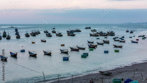 Vietnamese fishing boats anchored at sea, Mui Ne, Vietnam time lapse photo