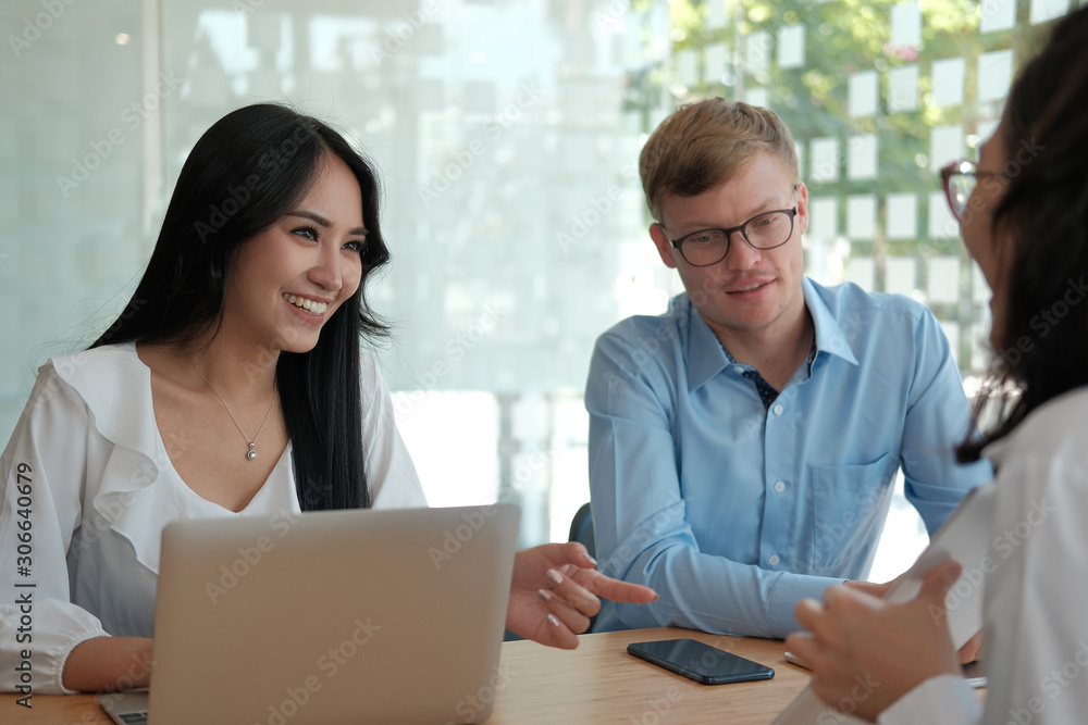 business people discussing on performance revenue in meeting. businessman working with businesswoman. business people discussing on performance revenue in meeting. businessman working with businesswoman.