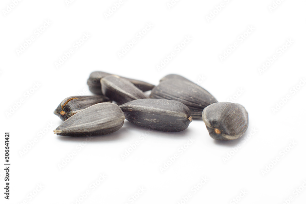 Processed sunflowers seeds isolated on white background with clipping path Processed sunflowers seeds isolated on white background with clipping path