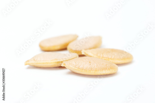 Processed Pumpkin seeds isolated on white background with clipping path
