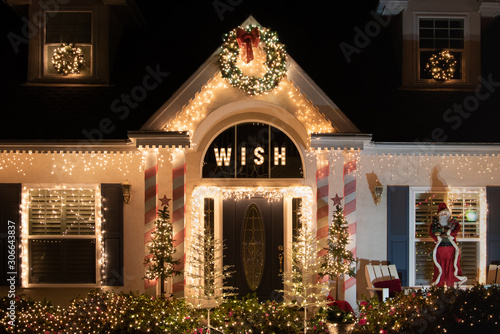 Christmas decorations on a house at night