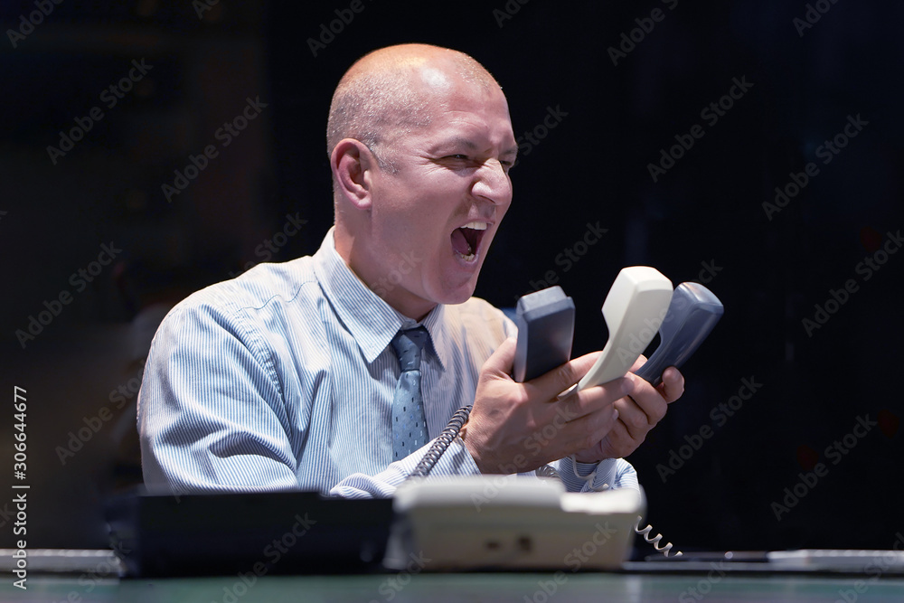 Office manager man in stress. A lot of phone calls. Office worker elderly  man shouting in the phone's. Funny face expression, emotions. Feelings  problems. Stock Photo | Adobe Stock