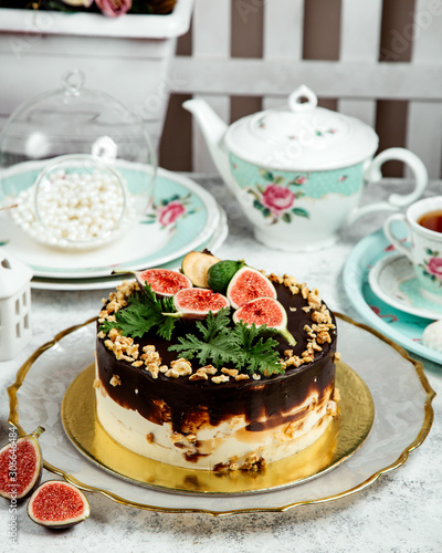 choloate cake topped with walnuts and fruits