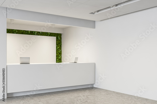 Reception table in modern office with grass