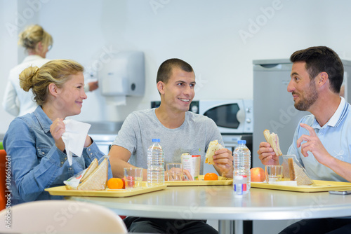 people having lunch break together