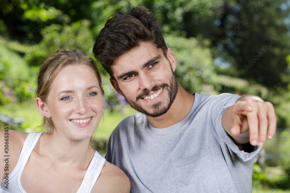 attractive couple together on meadow attractive couple together on meadow