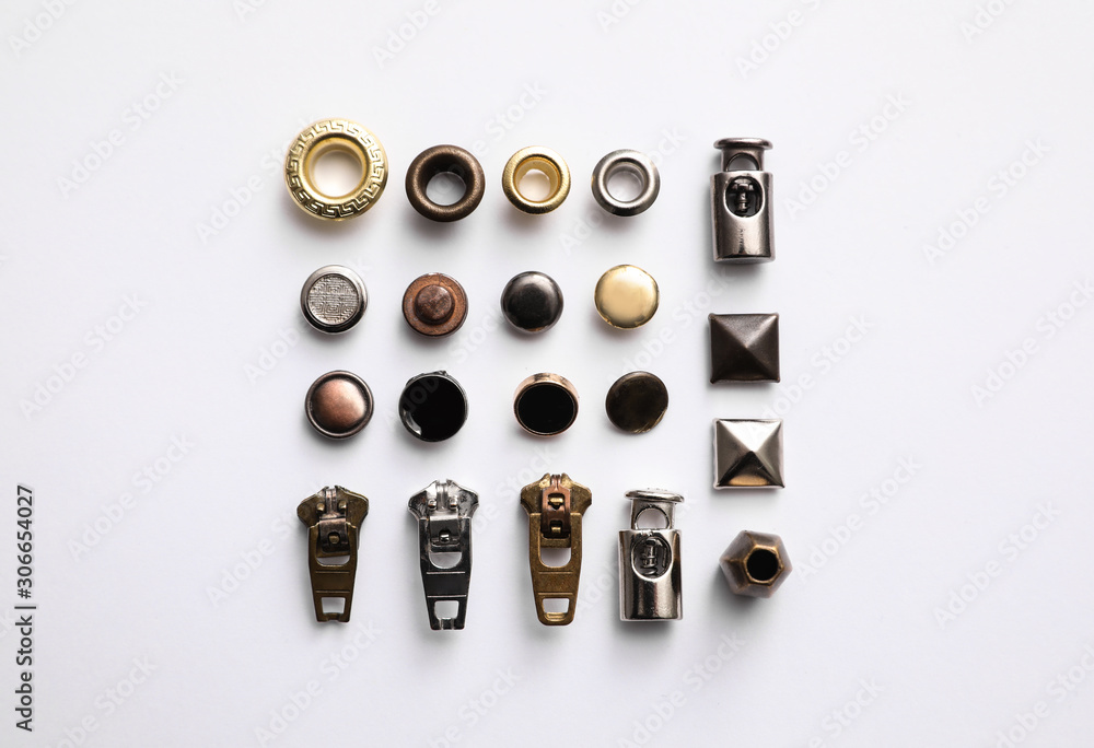 Garment accessories for jeans isolated on white, top view Garment accessories for jeans isolated on white, top view