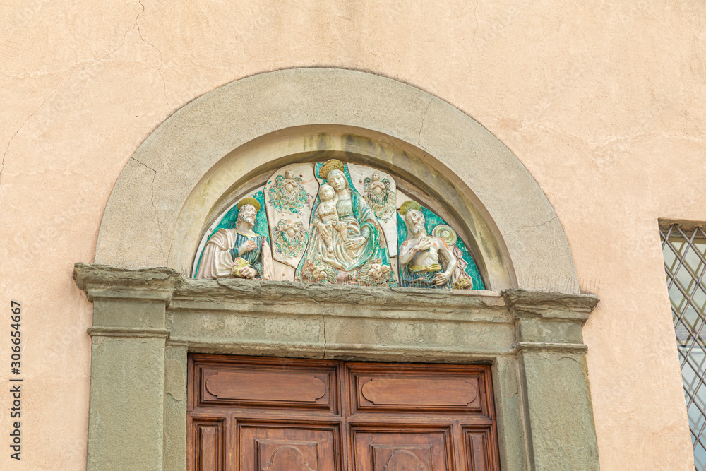 Bas-relief over the Church of St. Joseph door, Lucca, Italy.