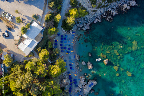 Aerial bird's eye view photo taken by drone of famous beach of Anthony Quinn with clear water rocky seascape, Rhodes island, Greece.