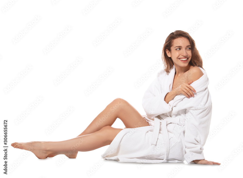 Beautiful young woman wearing bathrobe on white background Beautiful young woman wearing bathrobe on white background