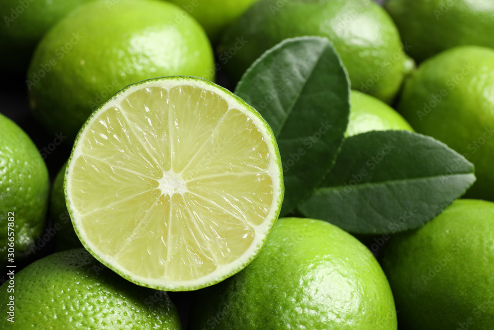 Fresh ripe juicy limes as background, closeup Fresh ripe juicy limes as background, closeup