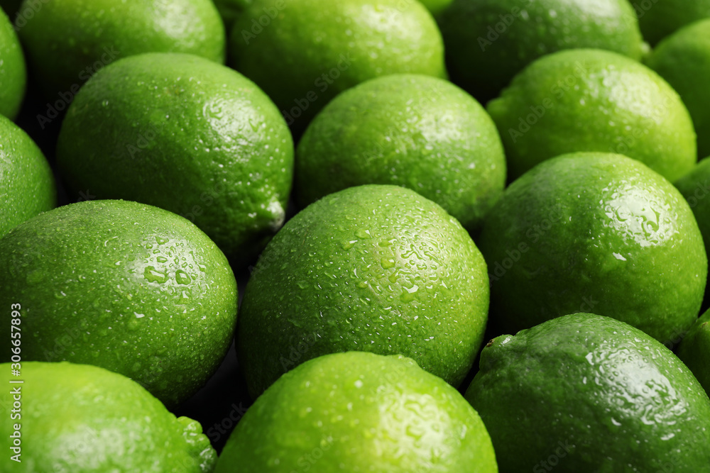 Fresh ripe juicy limes as background, closeup Fresh ripe juicy limes as background, closeup