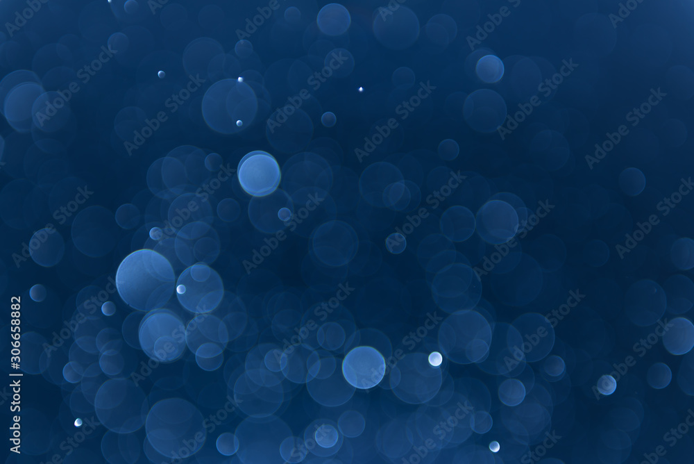 abstract sparkle bokeh light effect with navy blue background abstract sparkle bokeh light effect with navy blue background